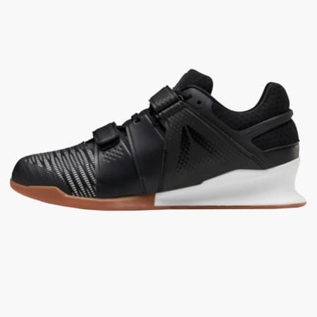 reebok legacy lifter plata Cinosural International School
